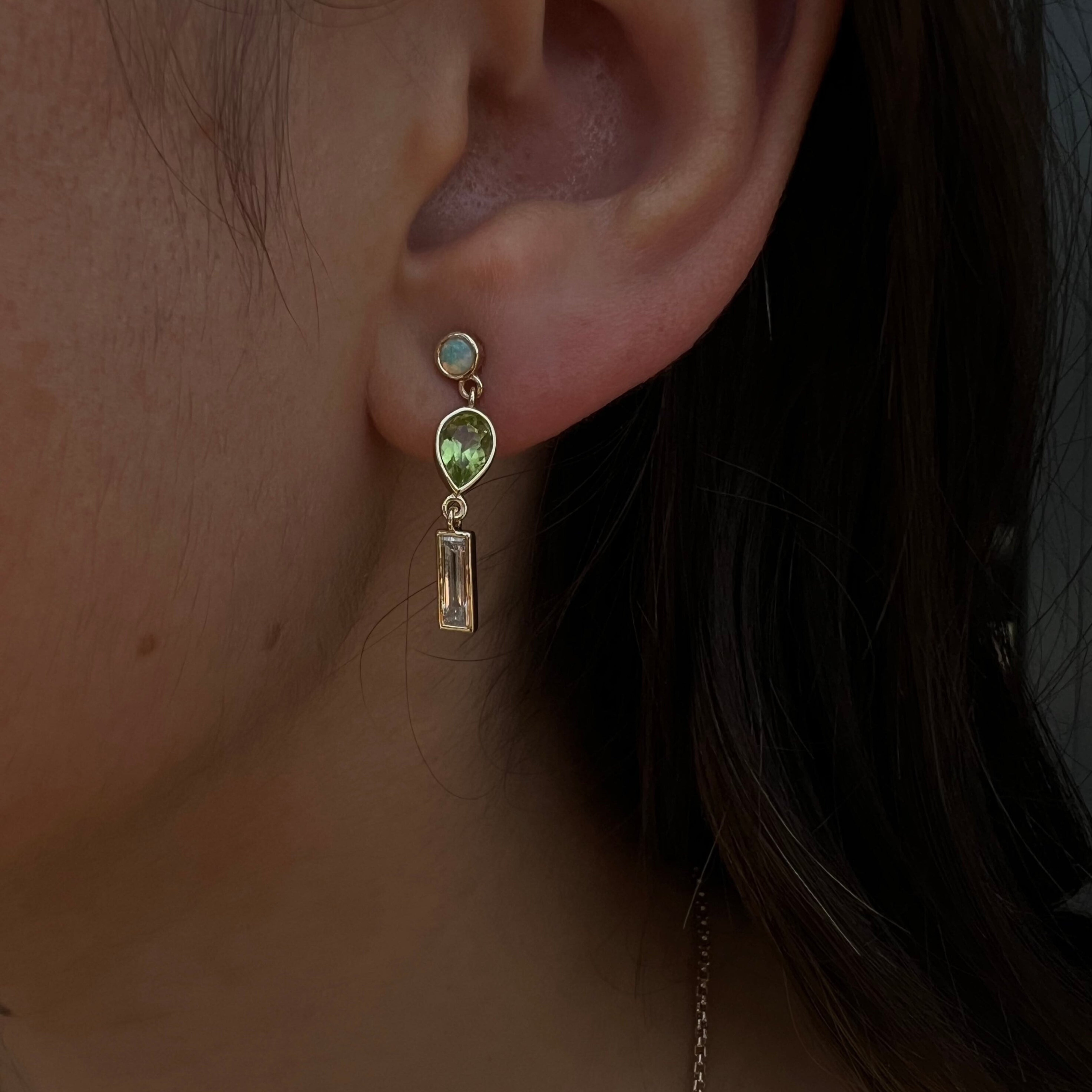 0.35tcw Diamond, 0.94tcw Peridot and Opal Earrings [in ear]