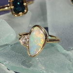 close up of opal and white diamond ring from to the sea collection