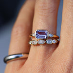 Close up of 1.59ct Sapphire and Diamond Ring with Tracer Band on hand