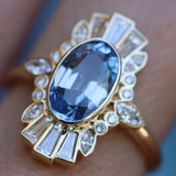 Close up of 2.26ct Sapphire Ballerina Ring on finger