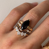 Close up of Black Onyx Noelle Ring stacked on hand