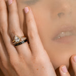 close up of woman resting hand against face, highlighting the Marrow Fine Til Death ring