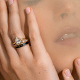 close up of woman resting hand against face, highlighting the Marrow Fine Til Death ring