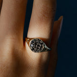 Close up of New Moon Signet Ring on hand