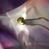 Peridot Heart Pendant Necklace [flat lay]