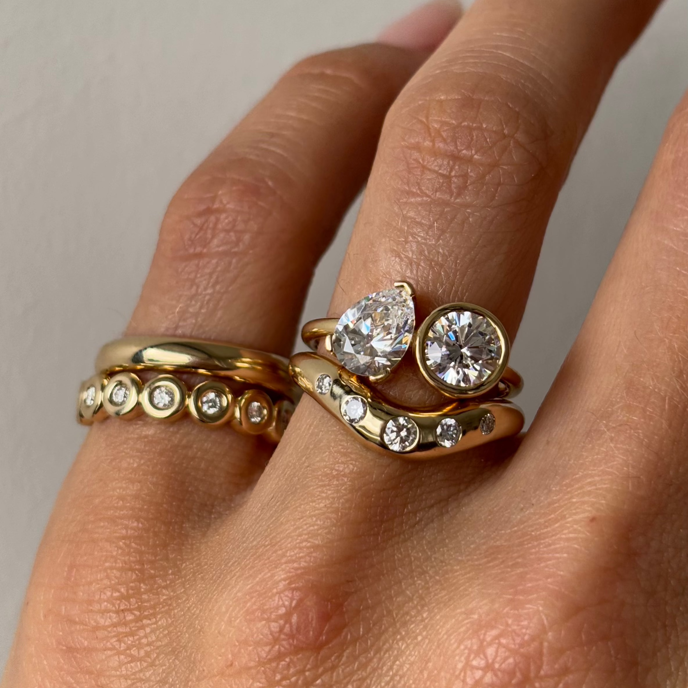 UGC photo of White Diamond Bombé Band stacked with other Marrow Fine rings