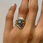 Close up of Forget Me Not Cameo Ring styled on hand